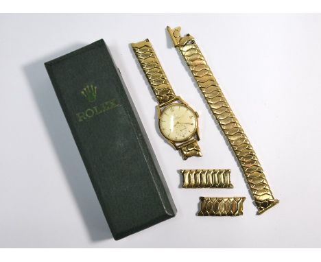 A gentleman's vintage 9ct gold Rolex wristwatch, the 28mm silvered dial with gilt mounts and subsidiary seconds, 15-ruby move
