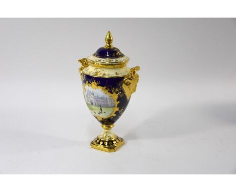 A Coalport China commemorative vase and cover of baluster form, on stemmed square foot, HRH Queen Elizabeth II 60th Birthday 