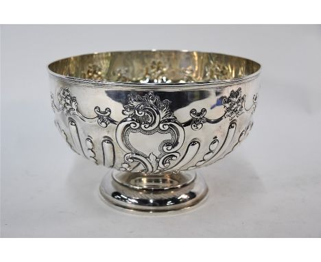 A late Victorian silver rose bowl/punch bowl with writhen reeding and foliate decoration, on stemmed foot, William Hutton &am