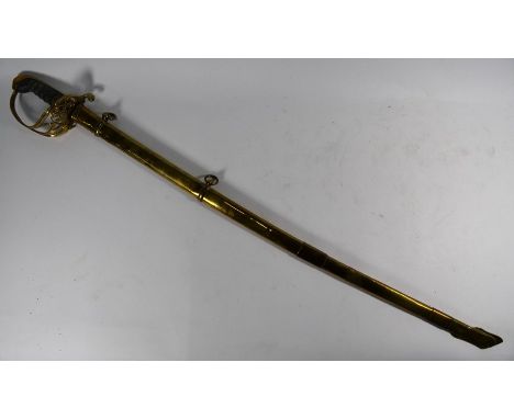 A Victorian cavalry sabre, 80 cm slightly curved blade with full-length back-rib, pierced brass basket hilt with wired fishsk