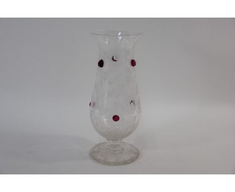 A Victorian clear cameo glass baluster vase on stemmed foot, with frosted relief floral and foliate decoration, the flowers c