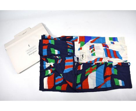 An Yvres Saint Laurent silk scarf hand printed with flags in green, red, white and turquoise on a navy ground, in original ca
