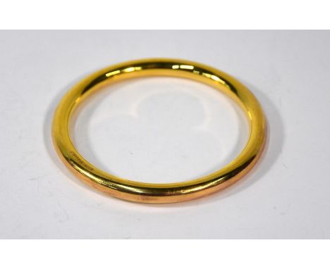 A 9ct yellow gold upper arm hollow bangle, Chester 1948, maker HG&amp;S, 0.4cm wide, 7 cm internal diam, approx 13.6g