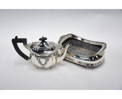 An Edwardian silver bachelor teapot with ornate embossed decoration, Nathan &amp; Hayes, Chester 1903, 10.4oz (324g) gross, t