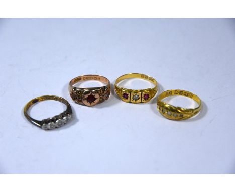 Four various antique rings - a three stone ruby and diamond gypsy set ring, 18ct yellow gold size N; a five stone diamond rin