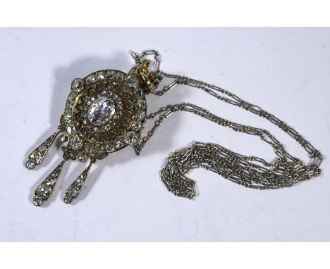 A Victorian diamond set pendant/brooch, an oval old mine cut diamond to the centre with surrounding rose cut diamond pierced 