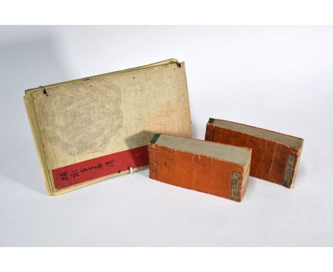 An early 20th century Japanese thread bound album of coloured woodblock kacho-ga prints/nishike-e and diptych prints of birds