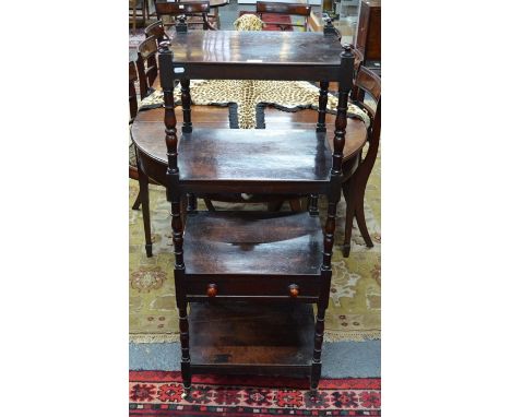 A Victorian mahogany four tier what-not with mid-height drawer, on ceramic castors, 49 cm w x 40.5 cm x 126 cm h