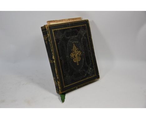 A Victorian embossed leather album containing a selection of paintings including fourteen miniature watercolours recording a 