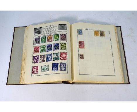 A stamp album containing a quantity of Victorian and later British, Empire, Commonwealth and foreign postage stamps