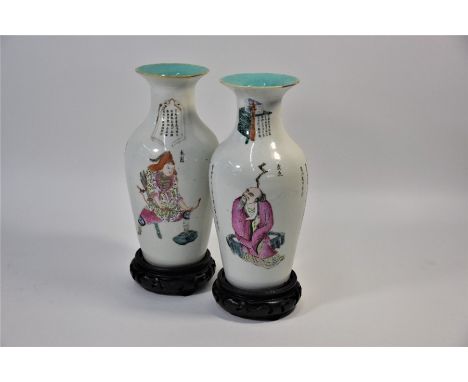 A pair of 19th century Chinese 'Wu Shuang Pu' famille rose baluster vases, Daoguang period (1821-1850) each decorated with tw