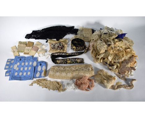 Box of assorted vintage lace including black net with embroidered chickens and flowers trimming, applique letters and other v