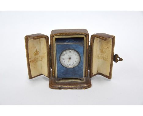 A silver and basse-taille enamel miniature travel carriage clock by JTC (Geneva Watch Co.), the dial inscribed for Asprey of 