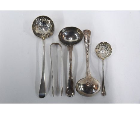 A pair of George III silver fiddle, thread and shell sauce ladles, Thomas Wilkes Barker, London 1811, a provincial white meta