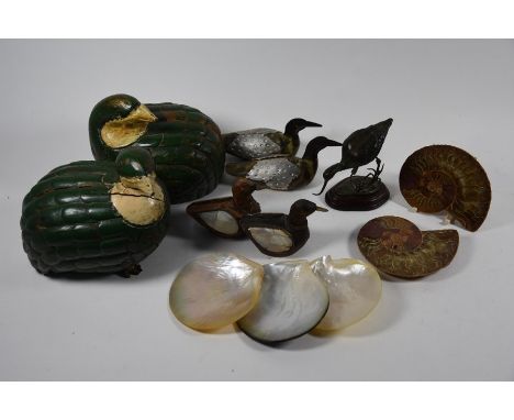A dissected and polished ammonite fossil, 11.5 cm wide to/w three mother-of-pearl shells, a small bronze figure of an avocet 