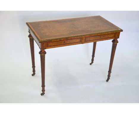 An antique Louis XVI style ormolu mounted walnut/kingwood side table, with pair of short frieze drawers raised on part fluted