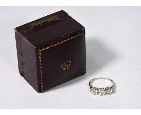 A graduated three stone diamond ring, circa 1920-40, white gold set (unmarked), size H, approx 1.36 caratsDiamonds face up wh