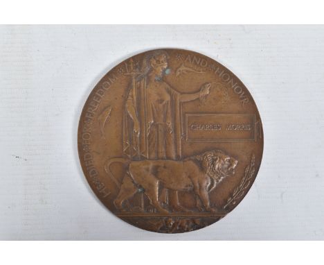 A WORLD WAR ONE MEMORIAL DEATH PLAQUE, named to Charles Morris, no other relating documentation, there are multiple casualtie