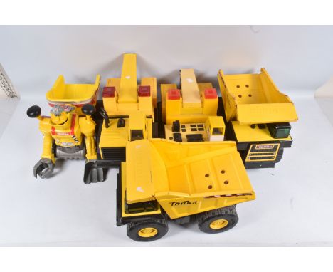 FOUR MIGHTY TONKA TOYS VEHICLES, all later examples, comprising two Dumper Trucks and two Breakdown/Tow Trucks, the later mor