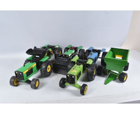 A QUANTITY OF TONKA TOYS FARM TRACTOR MODELS, two green versions with front loading shovel and two green and one blue example