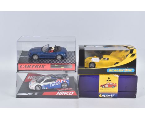 FOUR BOXED SLOT CAR MODELS, all 1/32 scale, Scalextric Sport Mitsubishi Lancer Evolution 7 WRC RN8 (McRae/Senior), limited ed