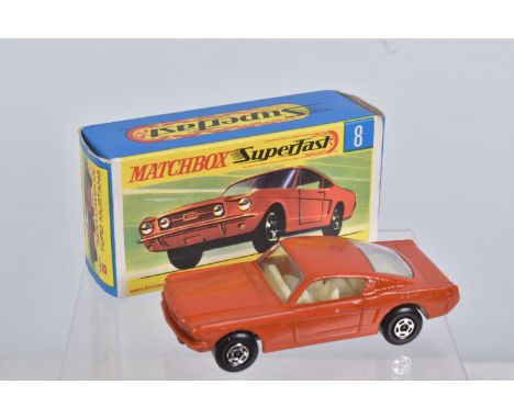 A BOXED DIE CAST MATCHBOX NEW SUPERFAST FORD MUSTANG NO. 8 MODEL VEHICLE, orange/red body with ivory/ off white interior, wid