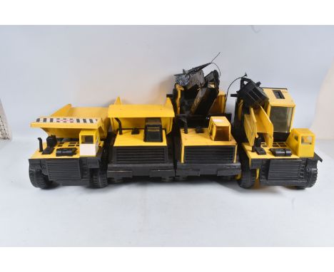 FOUR ITEMS OF MIGHTY TONKA TOYS CONSTRUCTION EQUIPMENT, all are later versions, two lorry/truck mounted Grab Cranes, one appe