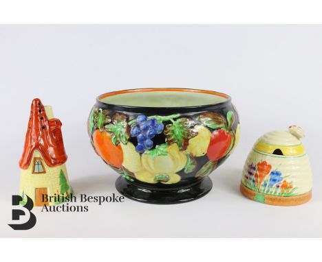 Clarice Cliff ceramics, including Clarice Cliff for Newport Pottery honey pot and cover with bee finial; Carlton Ware pepper 