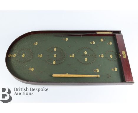 1930's bagatelle board, in the original box with instructions., together with a childs guitar, approx 93 l x 31 w x 18.5 cms.