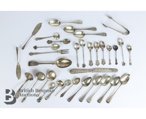 Miscellaneous silver spoons, including sugar spoon, floral butter knife, dessert spoon, two butter knives, sugar nips, pickle