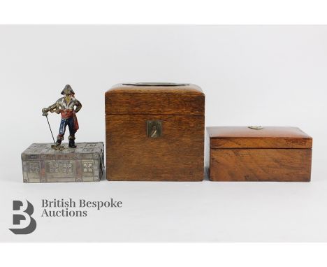 Fruitwood cigarette box, approx 15 x 10 x 7.5 cms, a small treasure chest surmounted with a pirate together with a lockable o