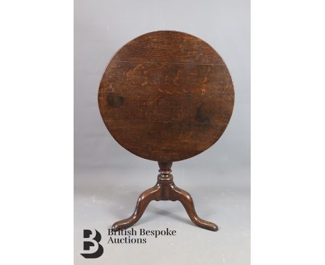Mahogany wine table.&nbsp; The table having a turned column on tripod base.