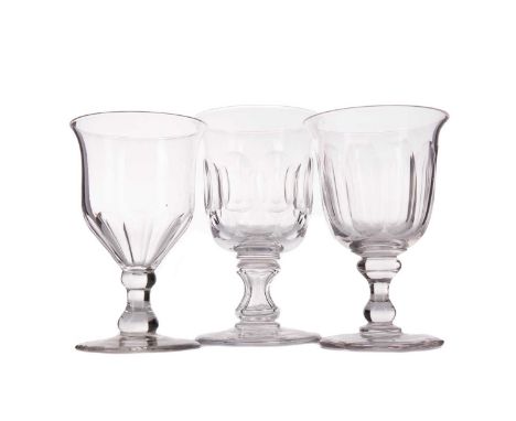 VICTORIAN GLASS RUMMER,with double series facet cut flared bucket bowl, over a faceted hollow waisted stem and circular foot,
