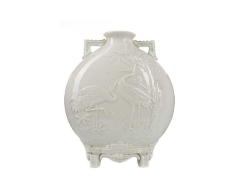 ROYAL WORCESTER AESTHETIC MOVEMENT MOON FLASK,with twin handles, the body moulded with herons and bamboo trees, on four feet,