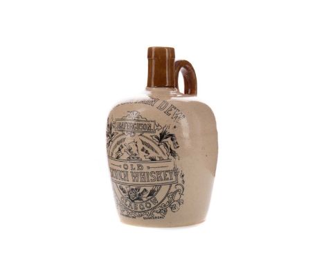 J&amp;A FERGUSON GLASGOW 'MOUNTAIN DEW OLD SCOTCH WHISKY' STONEWARE JUG,of shouldered form with hoop handle, 19cm