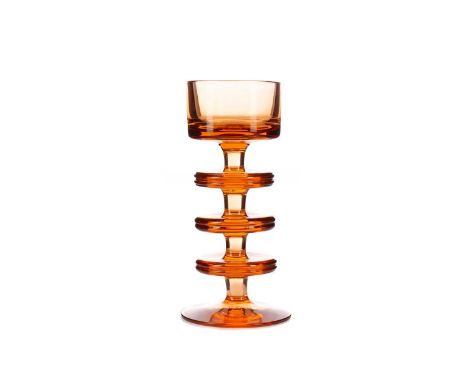 AMBER GLASS CANDLESTICK BY RONALD STENNETT WILSON FOR WEDGWOOD,three rings on circular foot, 16cm highCondition report: Some 