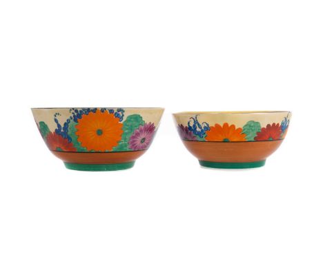 TWO BIZARRE BY CLARICE CLIFF GAYDAY BOWLS,both on tapered foot, the larger for Newport Pottery, 20.1cm diameter, the smaller 