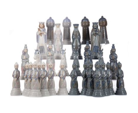 LLADRO FIGURAL CHESS SET,thirty-two pieces, the tallest piece 17.8cm high, the smallest 13.1cm, with associated games table, 