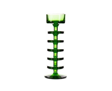 GREEN GLASS CANDLESTICK BY RONALD STENNETT WILSON FOR WEDGWOOD,five rings on circular foot, 21.5cm highCondition report: Some