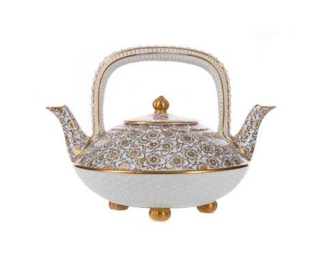 AESTHETIC ROYAL WORCESTER TWIN SPOUT TEAPOT,of squat circular form, transfer printed and gilded with flower heads, with lower
