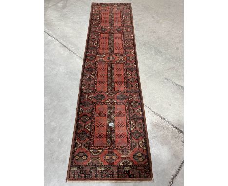 A red ground carpet runner. 108' long