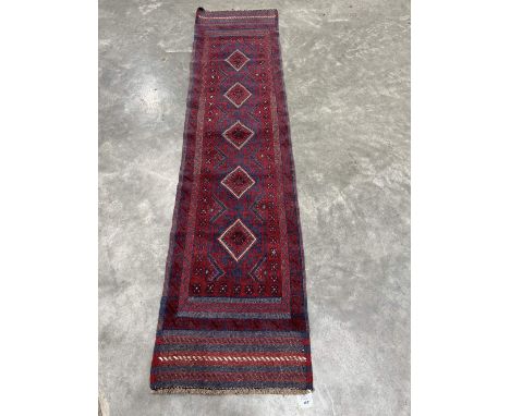 A Meshwani carpet runner. 2.5m x 0.61m