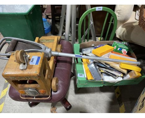 A child's chair; a wooden toy truck; a shooting stick, photographic slides and records