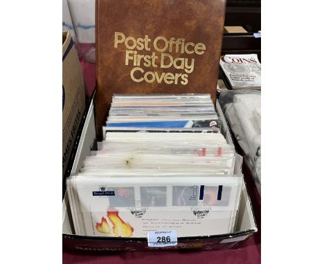 A collection of first day covers with an album