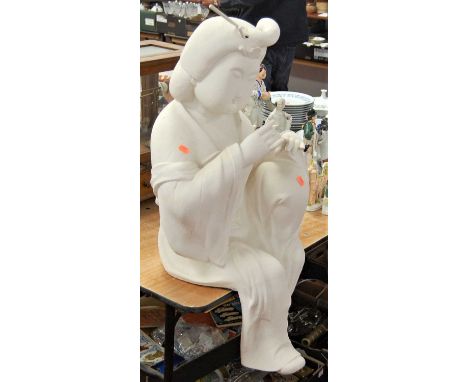 An Edenus Arts ceramic figure of a geisha girl in seated pose, height 80cm, together with a certificate of collection