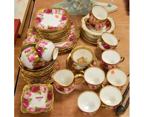 An early 20th century Royal Albert Crown china part tea service, pattern no 6241, each piece decorated with pink cabbage rose