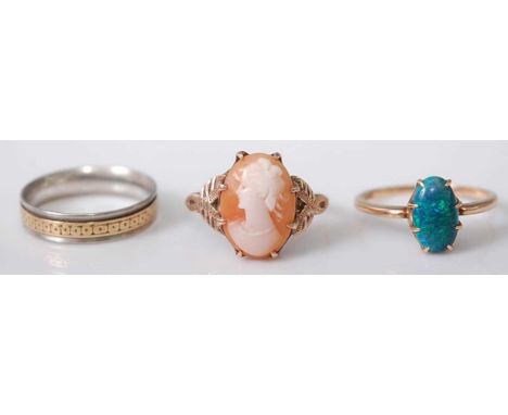 A 9ct gold carved shell cameo ring, 3.2g, size S; together with a 15ct gold opal ring, 2.1g, size Q; and a yellow and white m