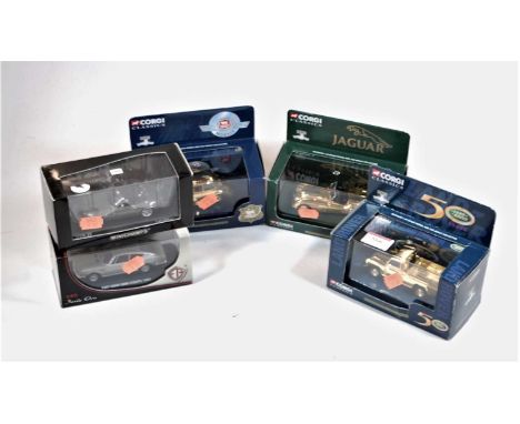 A collection of five various diecast model vehicles, to include a Corgi Classics gold plated Land Rover