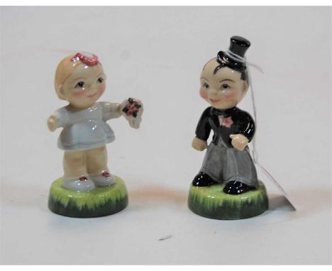 A pair of Carltonware Carlton Kids limited edition figures, the Bride numbered 167/5000 and Groom numbered 141/5000, h.10cm 