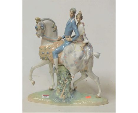 A large Lladro Spanish porcelain figure of a couple mounted on horseback having printed mark verso, impressed B14, height 46c